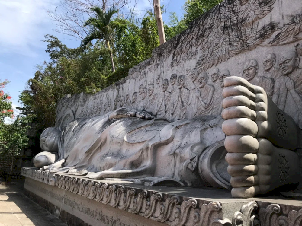 The 7-meter-long Reclining Buddha radiates peace, offering one of the most iconic scenes in Long Son pagoda photos